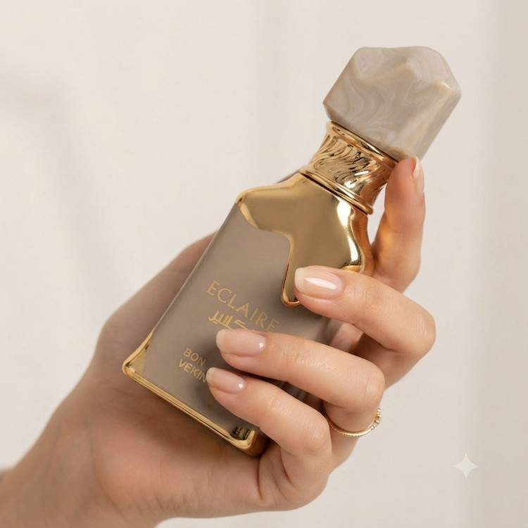 عطر جیبی زنانه وکینگ مدل اکلایر با رایحه گرم و شیرین حجم ۲۵ میلی لیتر
