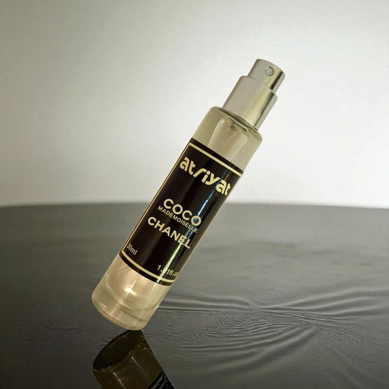عطر جیبی زنانه عطریات مدل کوکو مادمازل با رایحه معتدل حجم 30 میلیلیتر