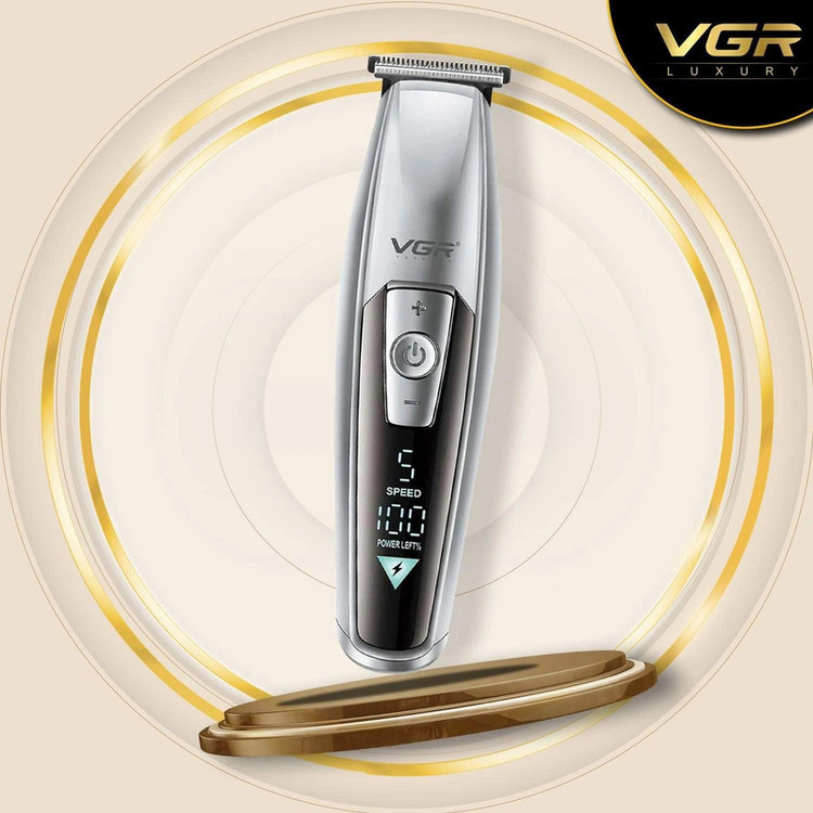 ماشین اصلاح موی سر و صورت وی جی ار مدل V-970 با تیغه استیل ضد زنگ، باتری قابل شارژ با 240 دقیقه استفاده، 5 سرعت قابل تنظیم، طراحی ارگونومیک و 3 شانه تنظیم طول 2، 3 و 4 میلیمتر