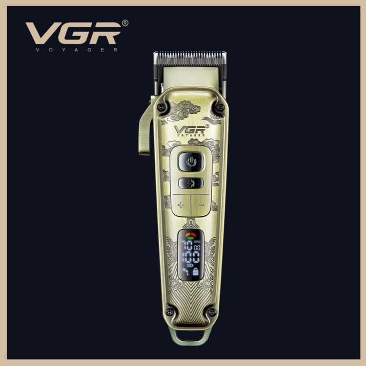ماشین اصلاح موی سر و صورت وی جی آر مدل V-005 با تیغه کربن استیل و متالوژیک پودری، باتری لیتیومی 2600 میلیآمپر، نمایشگر LED، قابلیت تنظیم سرعت و 8 شانه اندازهگیری از 1.5 تا 19 میلیمتر، مدت استفاده 250 دقیقه پس از شارژ کامل