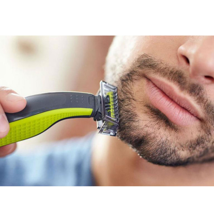 ماشین اصلاح موی صورت و بدن فیلیپس مدل OneBlade Sensitive با تیغه تیتانیوم پیشرفته، طراحی ارگونومیک، مقاوم در برابر آب، قابلیت اصلاح با شماره صفر، استفاده به صورت خشک و مرطوب