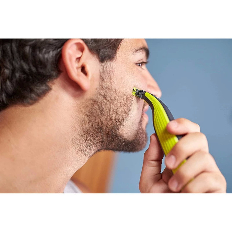 ماشین اصلاح موی صورت و بدن فیلیپس مدل OneBlade Sensitive با تیغه تیتانیوم پیشرفته، طراحی ارگونومیک، مقاوم در برابر آب، قابلیت اصلاح با شماره صفر، استفاده به صورت خشک و مرطوب
