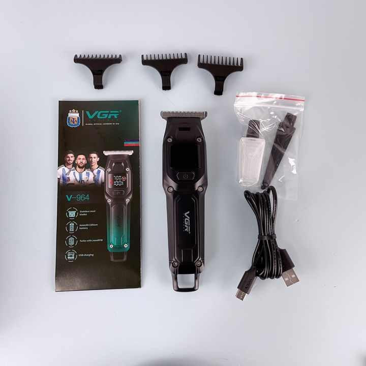 ماشین اصلاح موی سر و صورت وی جی ار مدل V-964 با تیغه کربن استیل، باتری لیتیومی 600 میلیآمپر، نمایشگر وضعیت باتری، عملکرد توربو، طراحی ارگونومیک و 3 شانه خط زن سایز 1، 2 و 3 میلیمتر