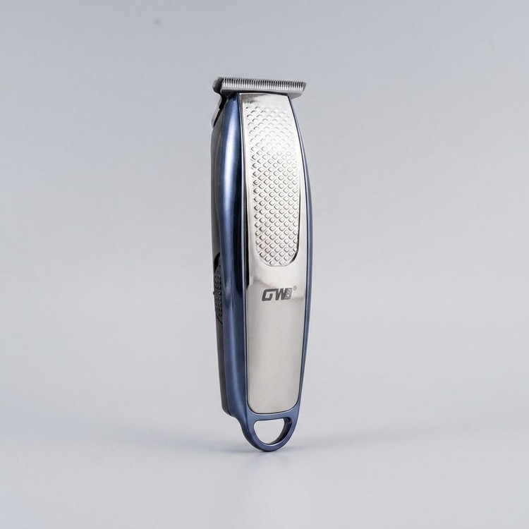 ماشین اصلاح موی سر و صورت جی دبلیو مدل GW-9753، صفر زن و خط زن، تیغه کروم، موتور 7000 دور در دقیقه، باتری 600 میلیآمپر ساعت، نمایشگر ال سی دی، شارژ با کابل USB، همراه با 3 شانه در سایزهای 0.5، 1 و 1.5 میلیمتر
