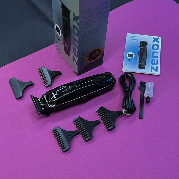 ماشین اصلاح موی صورت و بدن زیناکس مدل ZX-124 با تیغه کربن استیل، قابلیت اصلاح صفر و خط زن، نمایشگر شارژ، استفاده خشک و مرطوب، شارژ سریع با کابل USB، شانه اصلاح 1 تا 4 میلیمتر