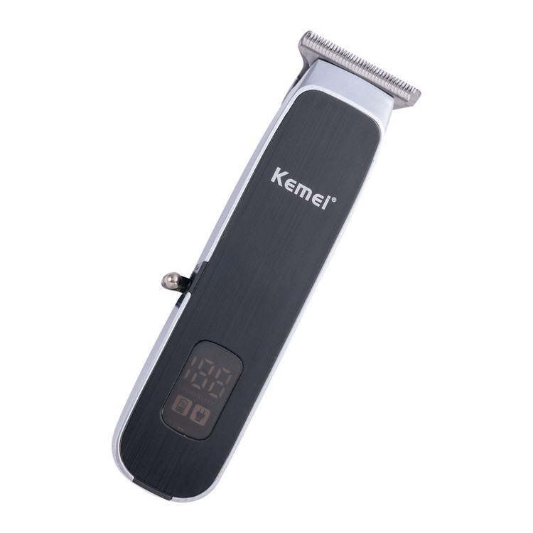 ماشین اصلاح موی سر و صورت کیمی مدل KM-1893، اصلاح به صورت خط زن، طراحی ارگونومیک، منبع انرژی با باتری، تکنولوژی اصلاح به صورت برش مستقیم، مدت زمان شارژ 120 دقیقه و مدت زمان استفاده پس از شارژ 90 دقیقه، به همراه برس تمیزکننده، کابل شارژ USB و روغن