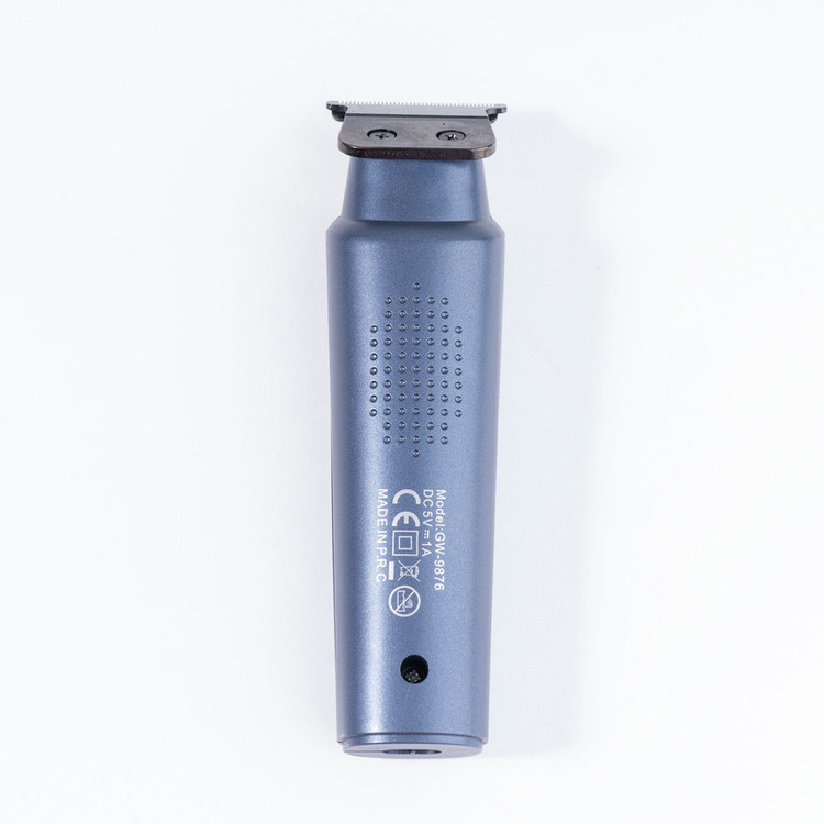 ماشین اصلاح موی سر و صورت جی دبلیو مدل GW-9876، اصلاح به صورت صفر زن، خط زن، منبع انرژی با کابل USB، تکنولوژی اصلاح به صورت تریم، اندازه اصلاح 1، 2 و 3 میلیمتر، بههمراه کابل USB، برس، روغن