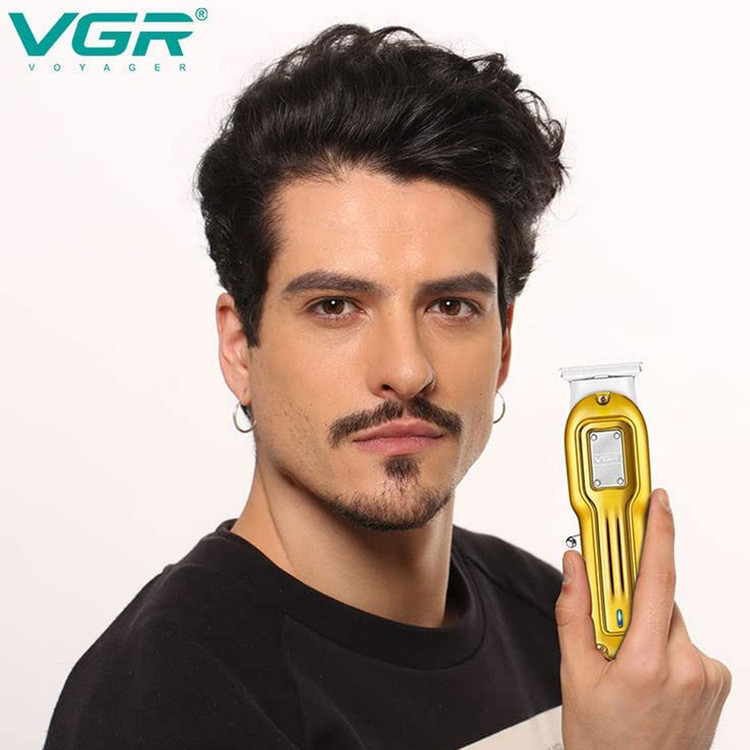 ماشین اصلاح موی صورت و بدن وی جی آر مدل 919 با تیغه پلاتینیوم، برش مستقیم، قابلیت اصلاح با شماره صفر، منبع انرژی کابل USB، همراه با 3 شانه متصل