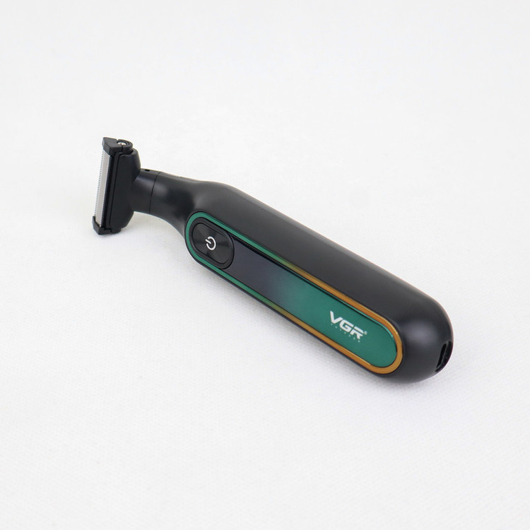 ماشین اصلاح موی صورت وی جی ار مدل V-360 professional با تیغه استیل دوطرفه، باتری لیتیوم یون 500 میلیآمپر ساعت، شارژ سریع تایپ سی، استفاده خشک و مرطوب، نمایشگر LED و قفل ایمنی ضد آب و شانه تنظیم شونده 0.1 تا 9 میلیمتری