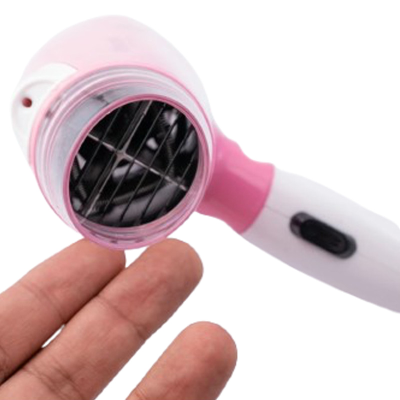 سشوار مسافرتی بای بابیلیس پرو مدل BP-1030 با توان 1600 وات، موتور AC، تنظیمات دو حالته دما و دو سرعته، سری حجمدهنده، وزن 300 گرم، دسته تاشو و خشککن ملایم