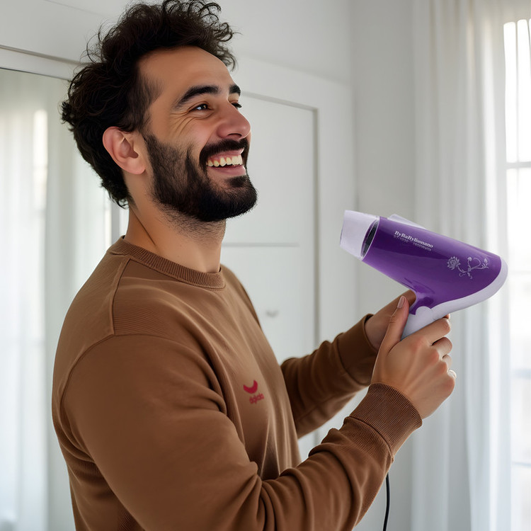 سشوار مسافرتی مدل st-1030 با توان 1600 وات، موتور AC، تنظیم دما یک حالته، تنظیم سرعت دو سرعته، صافکنندگی و حجمدهندگی، وزن 328 گرم، کاربرد خانگی