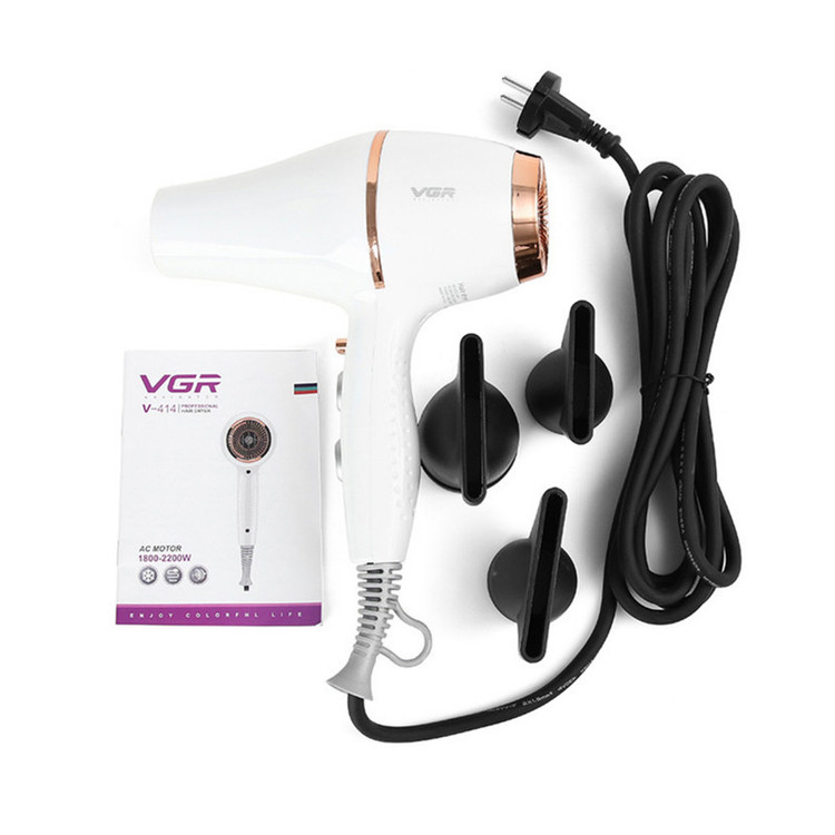 سشوار حرفهای 2200 وات وی جی ار مدل V-414، موتور AC، وزن 802 گرم، المنت سرامیک تورمالین، دارای سری متمرکزکننده باریک، متمرکزکننده پهن با ویژگی صافکنندگی، حجمدهندگی، با قابلیت تنظیم دما، فناوری تولید یون