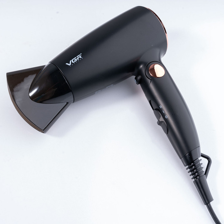 سشوار مسافرتی 1600 وات وی جی ار مدل V-439، موتور DC، وزن 300 گرم، المنت فلز، دارای سری متمرکزکننده باریک با ویژگی حجمدهندگی، با قابلیت باد سرد